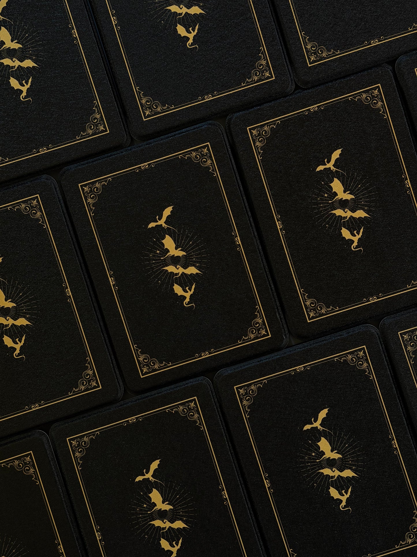 Kindle case with yellow gold decorative elements on a black background
